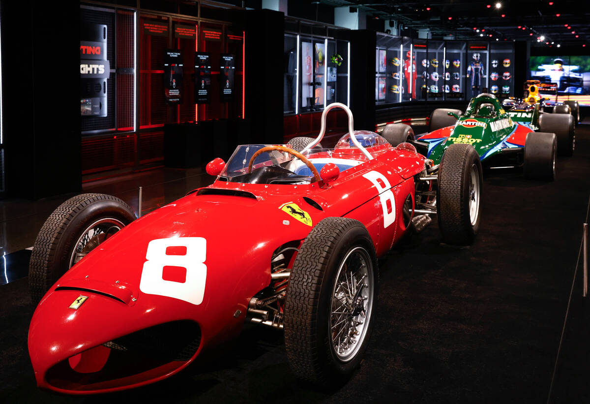 A replica of the 1962 Ferrari 156, left, a single-seat race car also known as "Sharknose", and ...