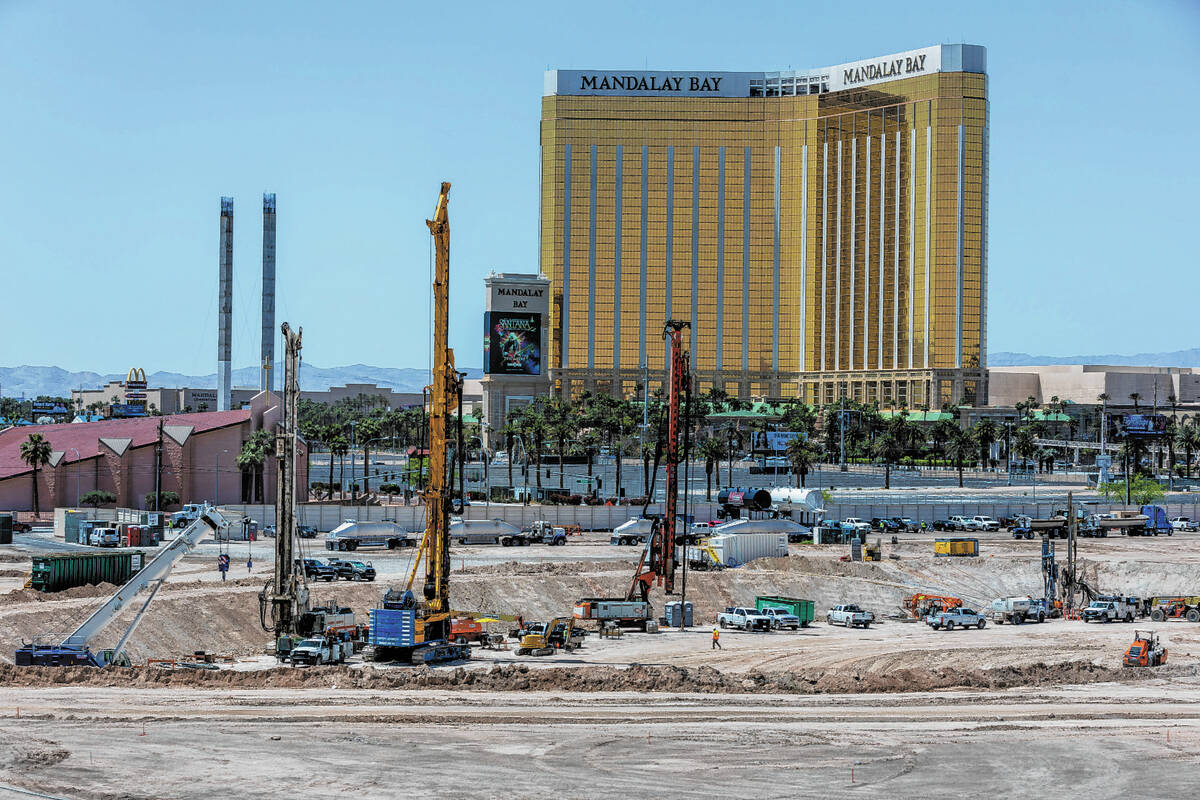 Construction crews drill caissons for the foundation of the new A's ballpark on the former Trop ...
