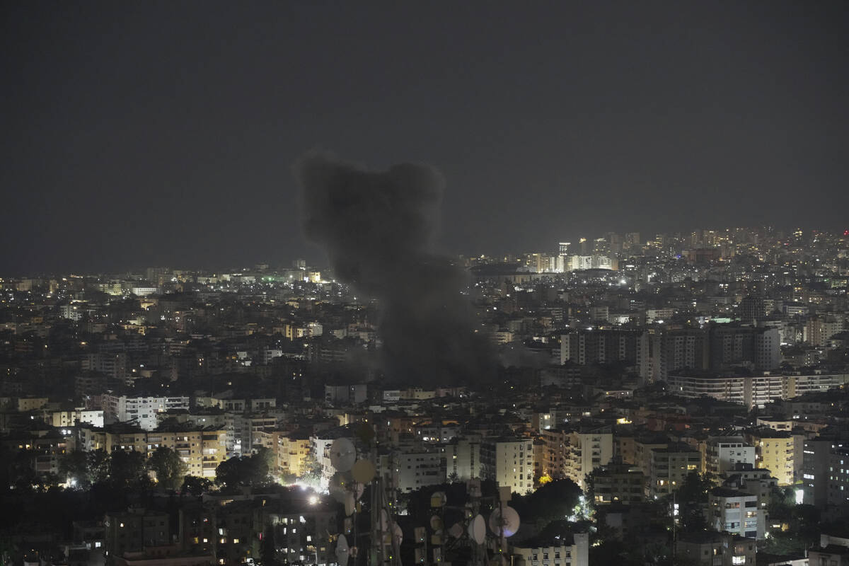 Smoke rises following an Israeli airstrike on Dahiyeh in the southern suburb of Beirut, Lebanon ...