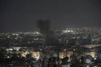 Smoke rises following an Israeli airstrike on Dahiyeh in the southern suburb of Beirut, Lebanon ...
