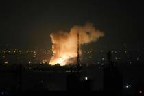 Smoke rises up after an explosion in Tehran, Iran, Friday, June 13, 2025. (AP Photo/Vahid Salemi)